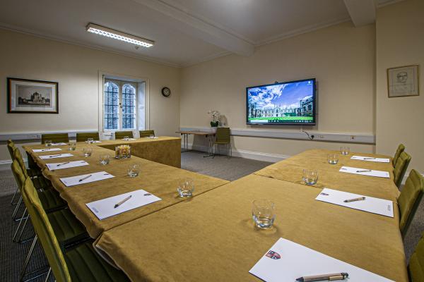 A more modern meeting space at Corpus Christi with smart screen for up to 25 people.